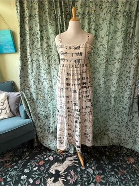Cream Printed Maxi Dress with Text Pattern